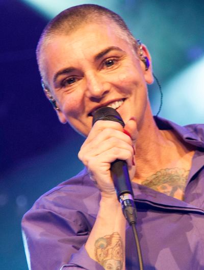 Sinéad O'Connor performing at the Cambridge Folk Festival 50th Anniversary in 2014
